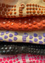 A variety of 5 different pilates grip socks displayed as part of a Gift Box Set perfect for the Pilates Princess. The socks all have great grip, some heart-shaped, some honeycomb-shaped. The colours range from beige, black and caramel to lavender purple and magenta pink. The designs are sporty, yet feminine and classy. 